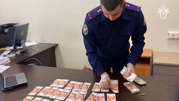 В Подмосковье задержаны чиновники, обвиняемые во взятках